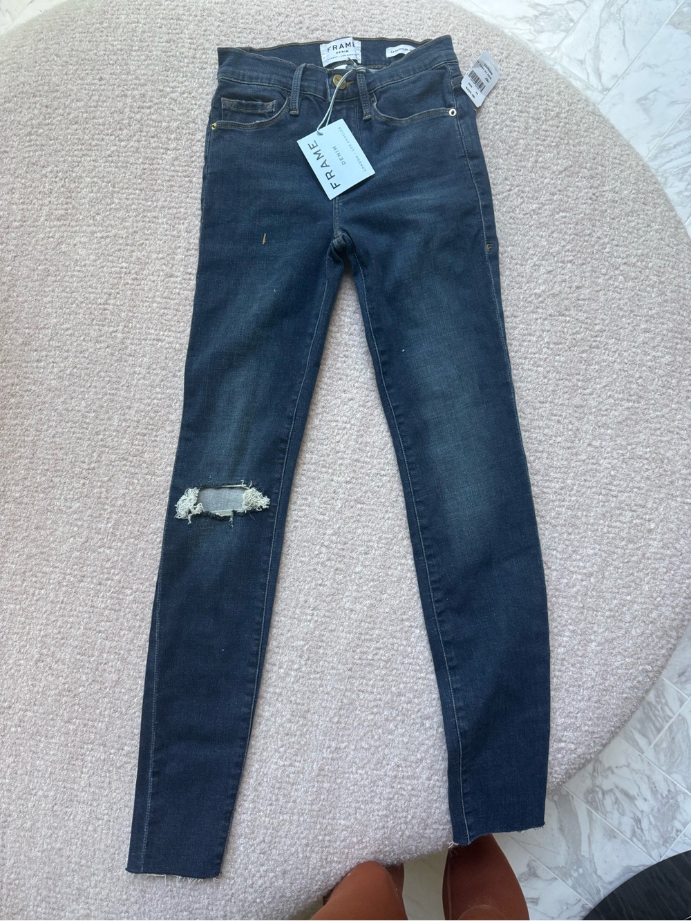 Frame Denim Skinny Jeans in Dark Blue with Distressed Knee